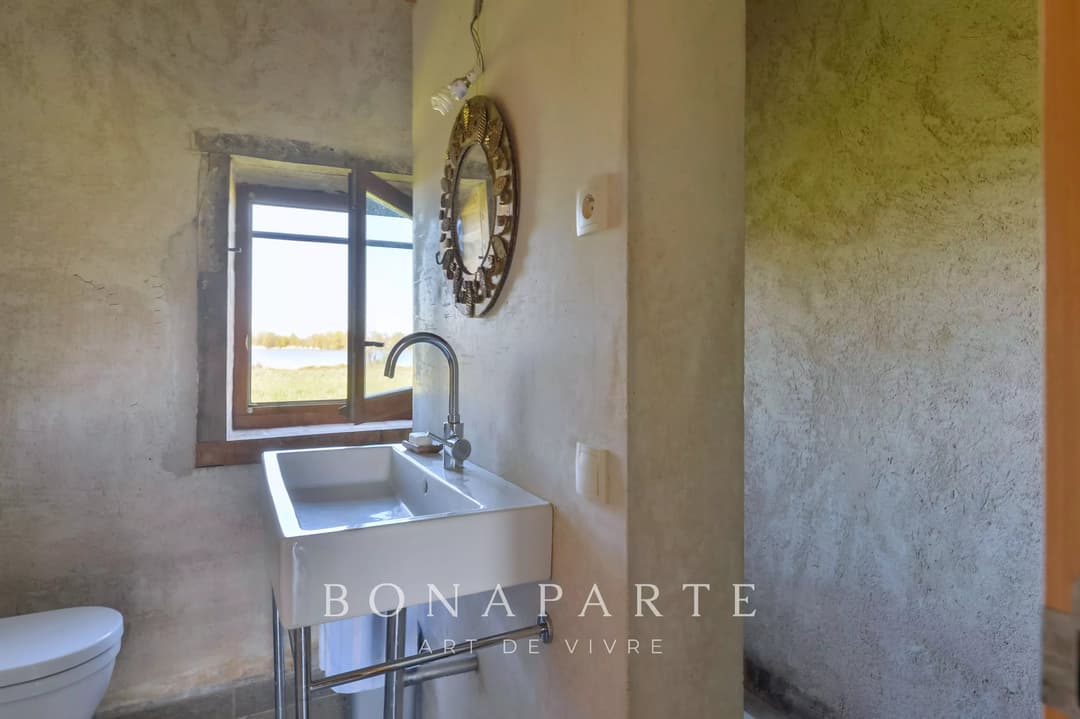 PROPRIÉTÉ EXCEPTIONNELLE DANS LA DOMBES- 118 hec DE PRAIRIES, BOIS ET ETANG - Photo 10