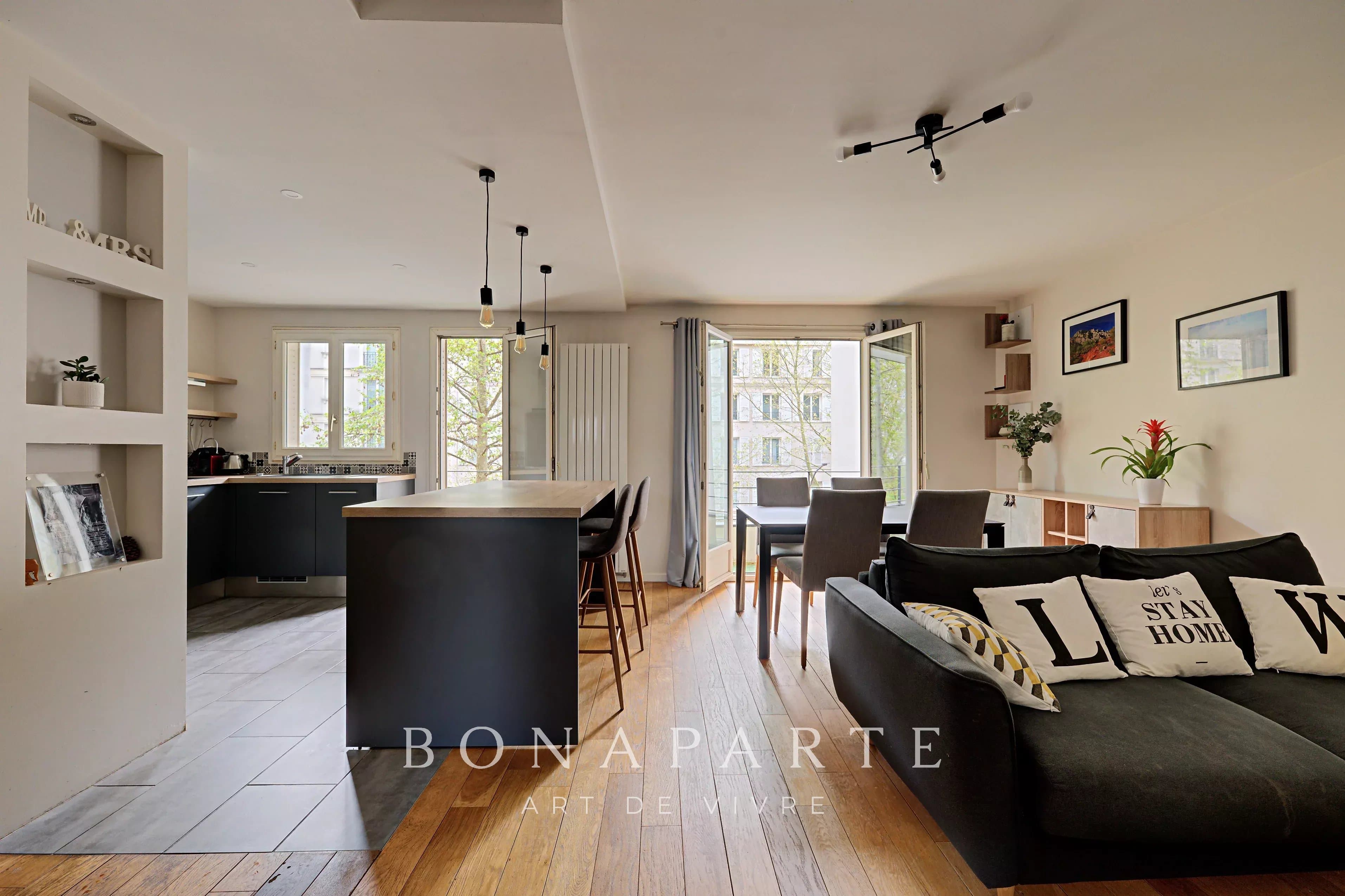 Trois pièces traversant avec balcons - Photo 1