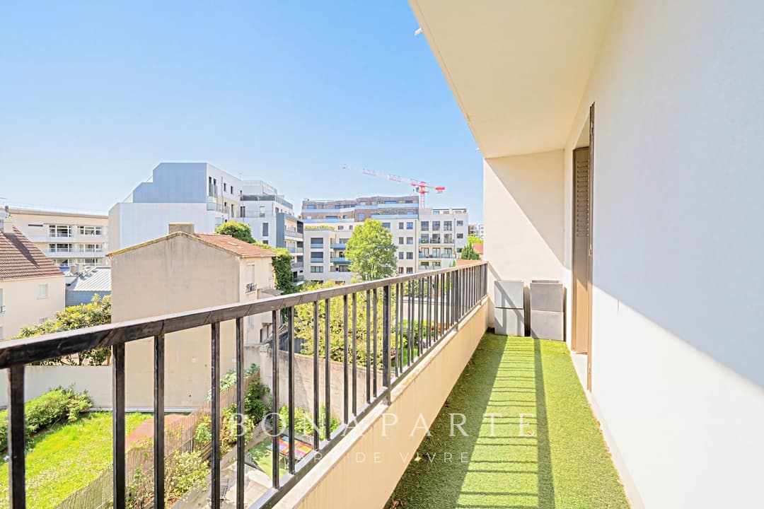 Trois pièces traversant avec balcons - Photo 16