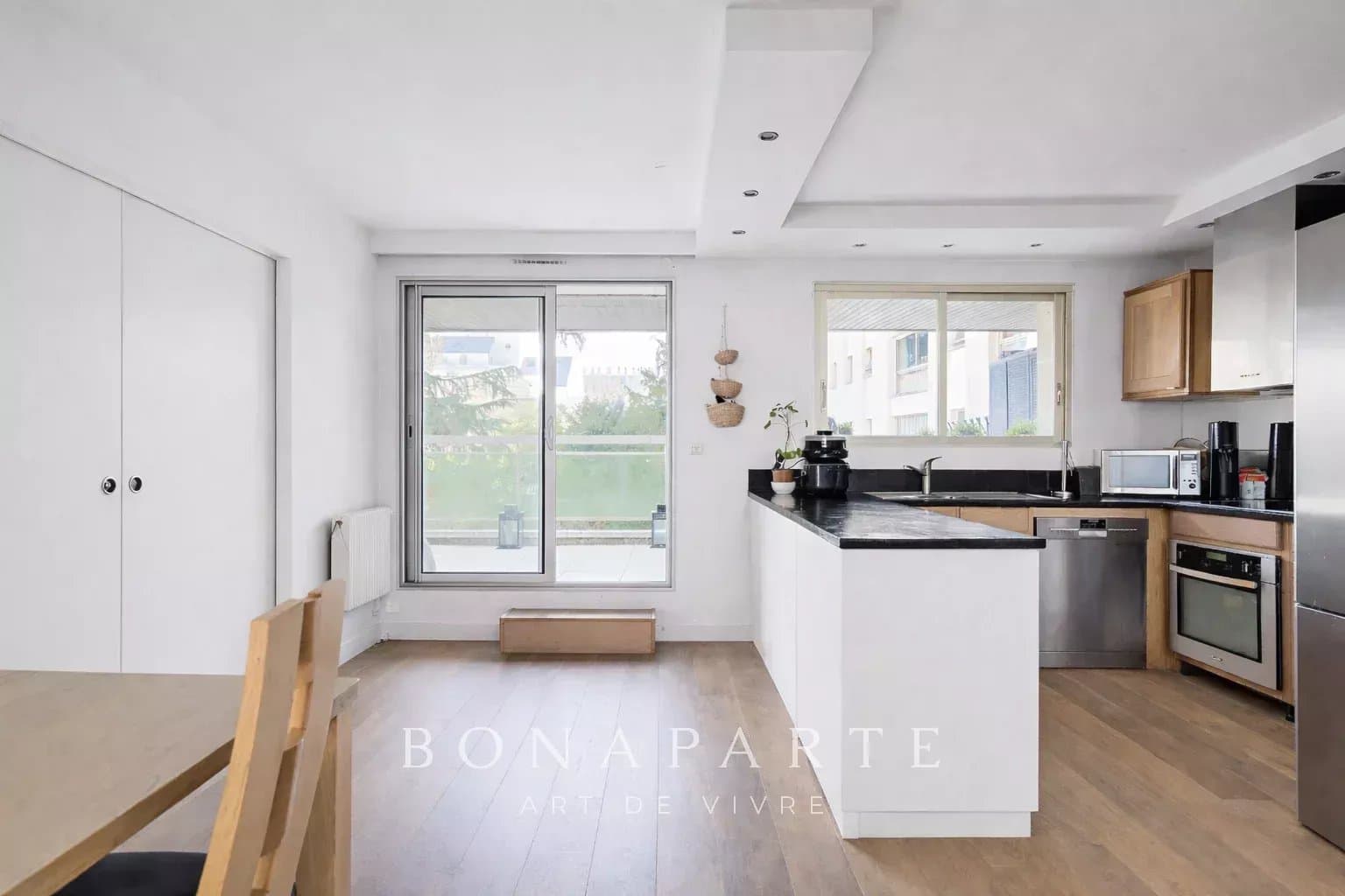 Appartement traversant avec deux terrasses - Photo 6