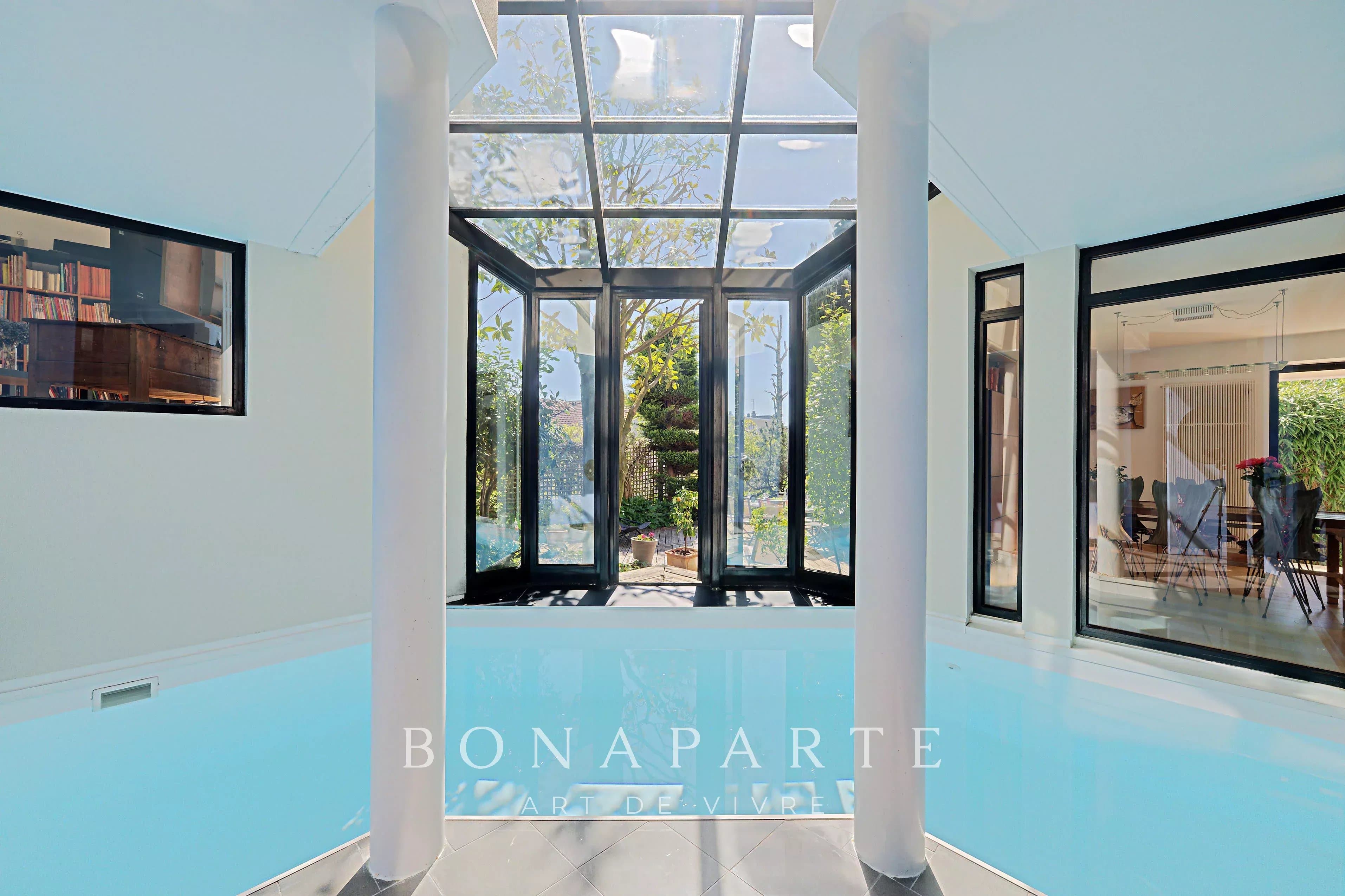 Maison d’architecte – 316 m² habitables – Dépendance indépendante – Piscine intérieure – Sous-sol total – Jardin paysagé de 800 m² - Photo 5