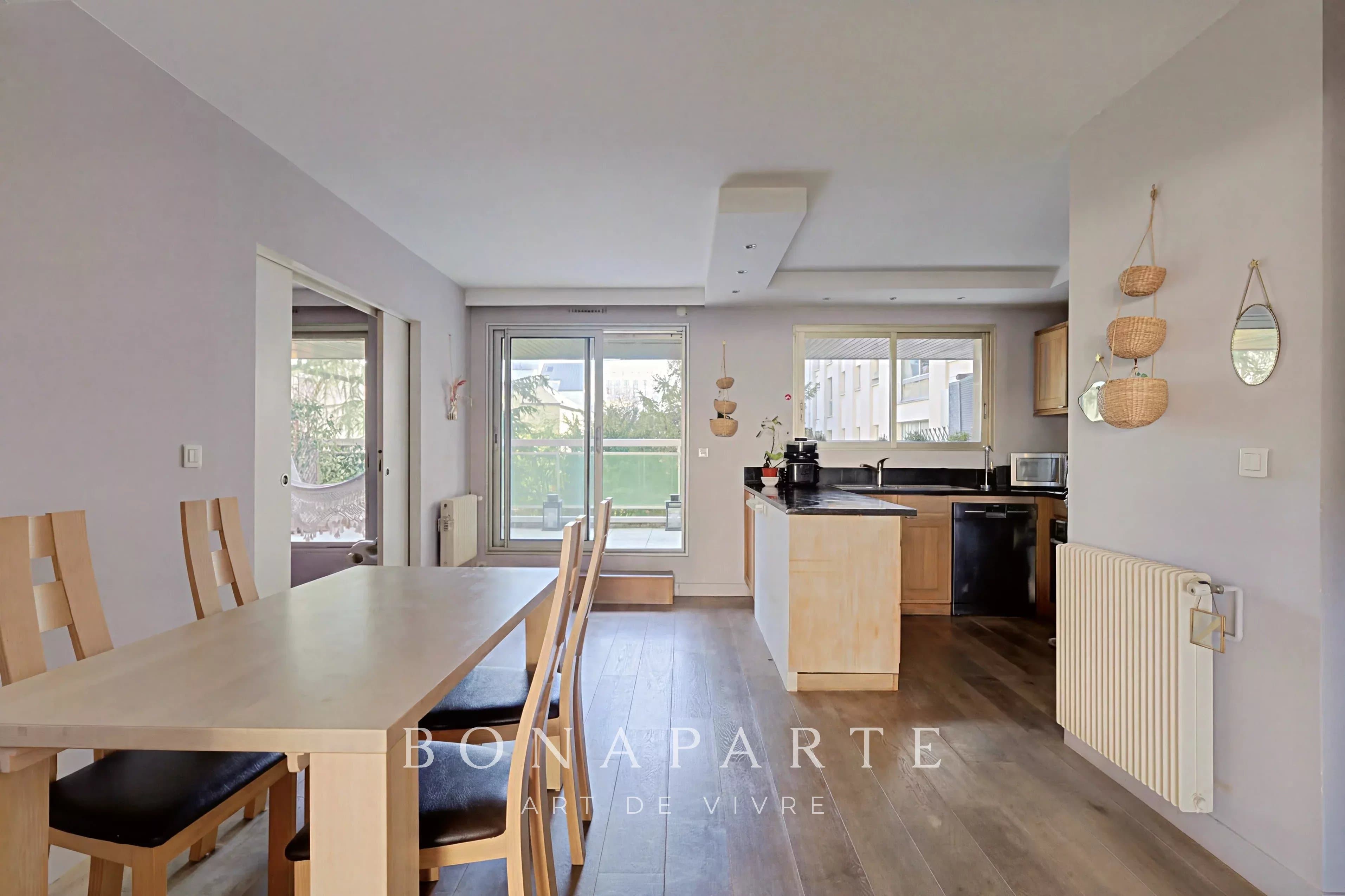 Appartement traversant avec deux terrasses - Photo 5