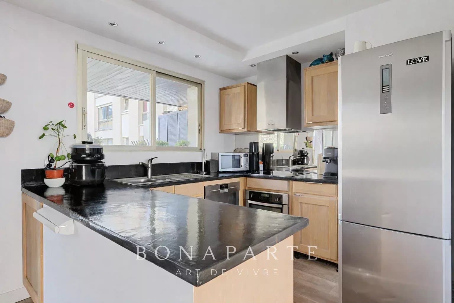 Appartement traversant avec deux terrasses - Photo 8