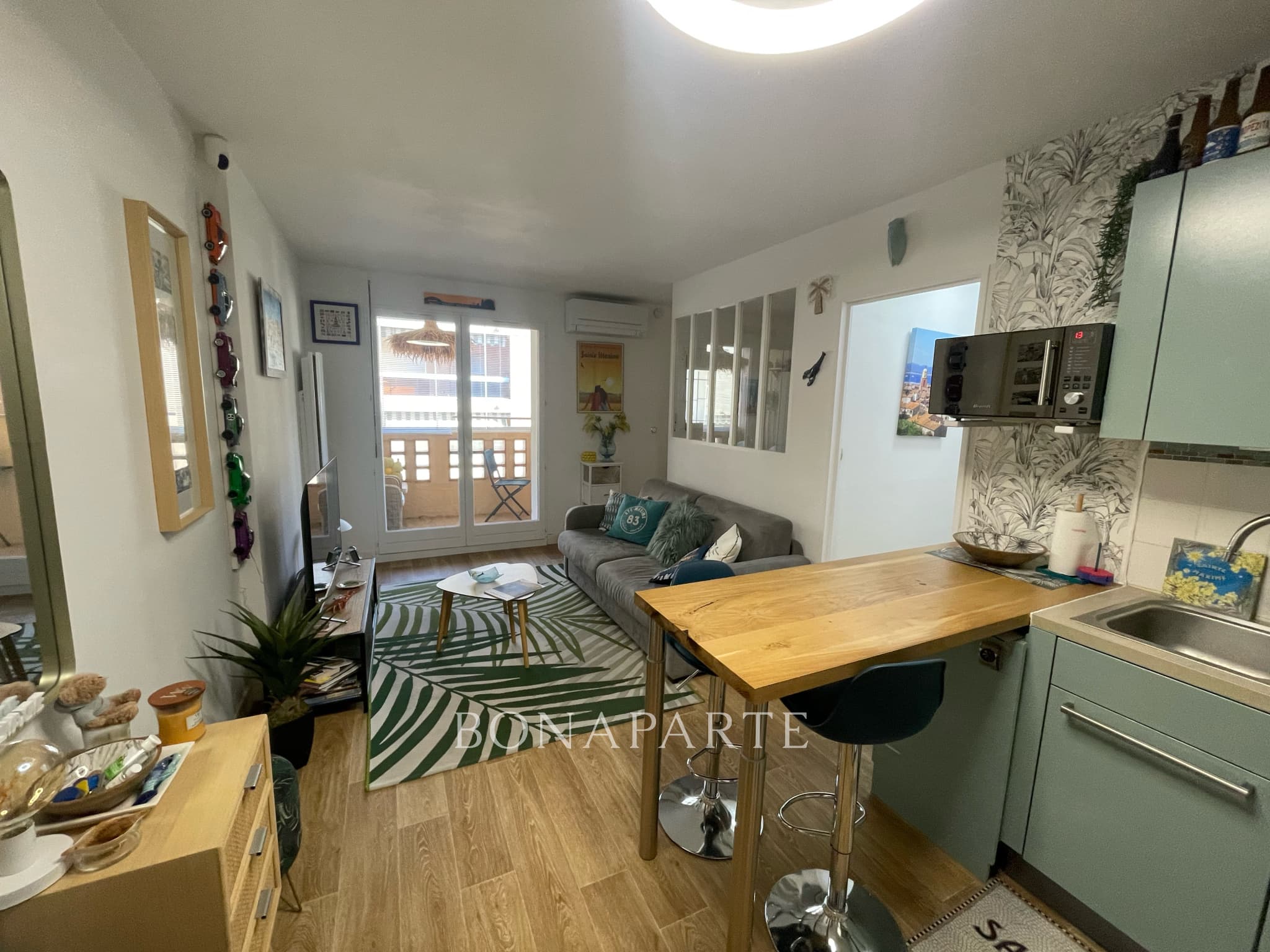 Appartement 1 chambre avec terrasse et garage en plein centr