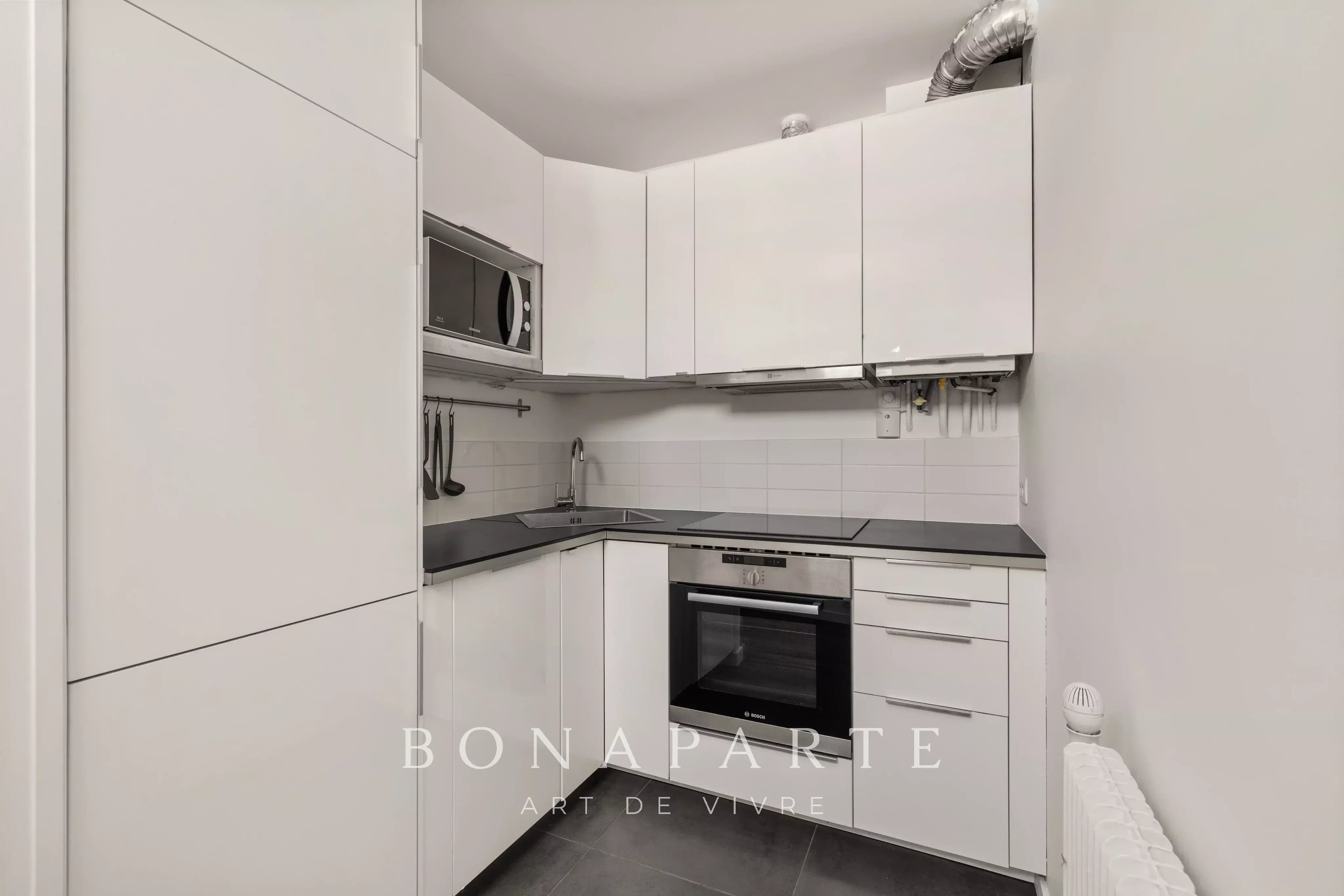 RUE FESSART - 2 PIÈCES TRAVERSANT - 47,83 M² - Photo 6